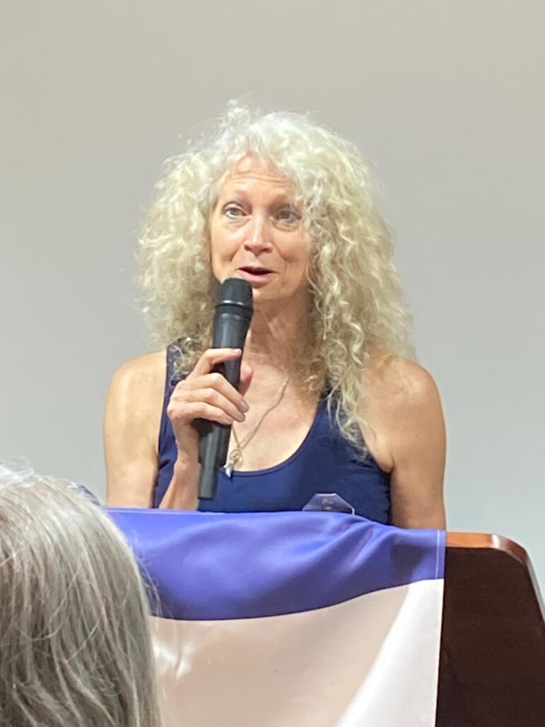 Leanne Babcock speaking on stage